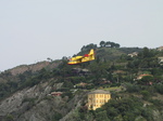 SX19805 Fire airplane approaching sea.jpg